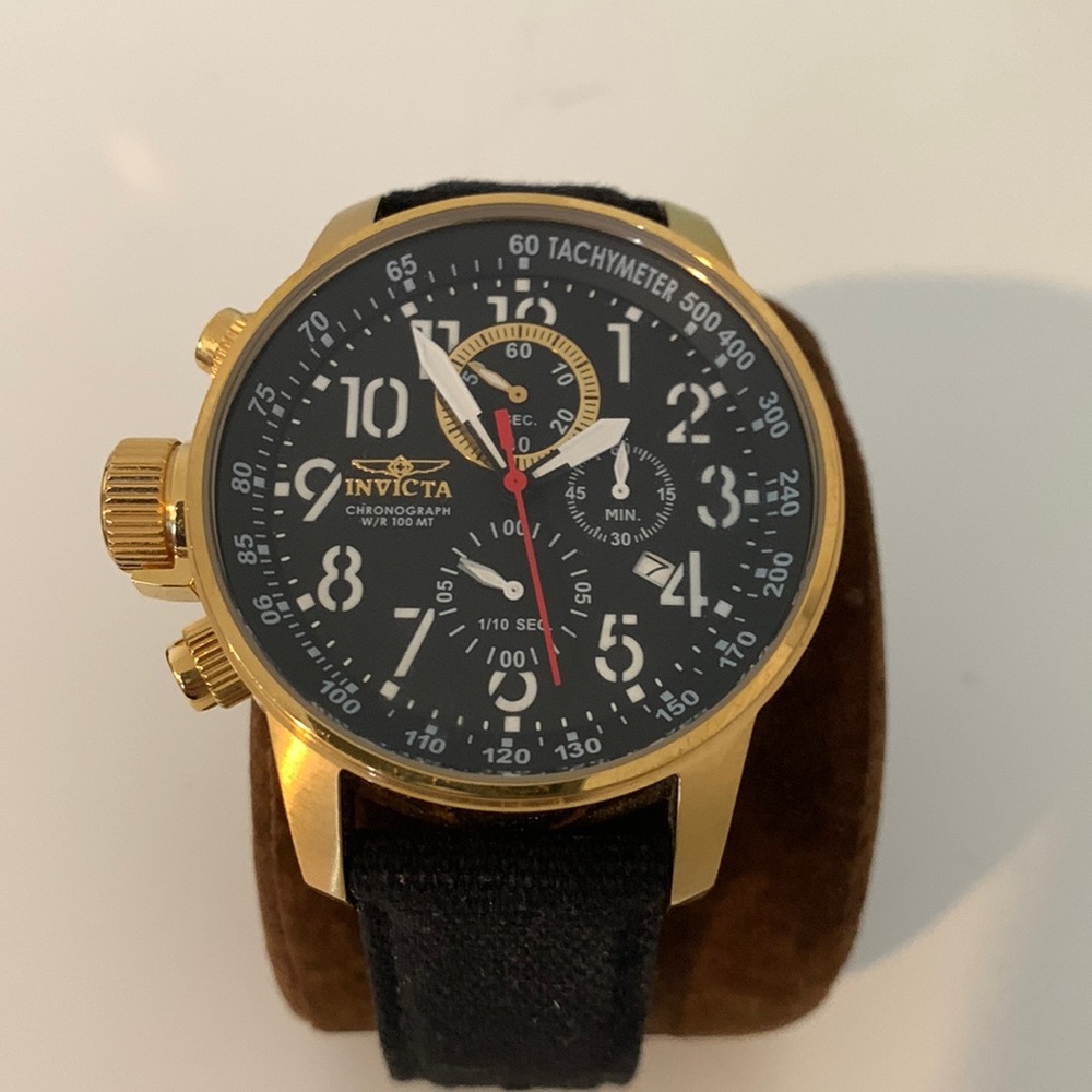 Invicta Watch large face gold tone black face